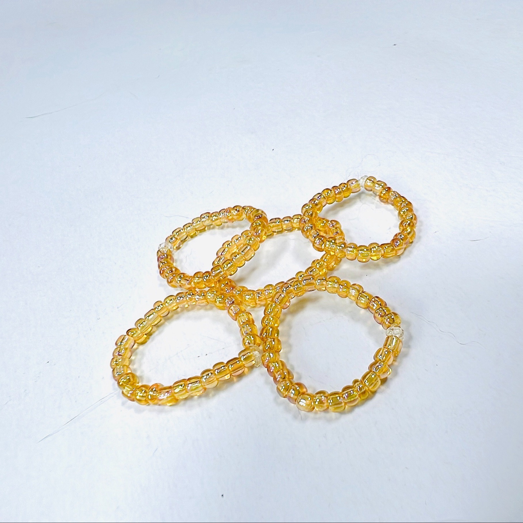 PHỤ KIỆN NỮ HANDMADE MÀU VÀNG MÃ 08 DẠNG TRÒN TRONG SUỐT LẤP LÁNH