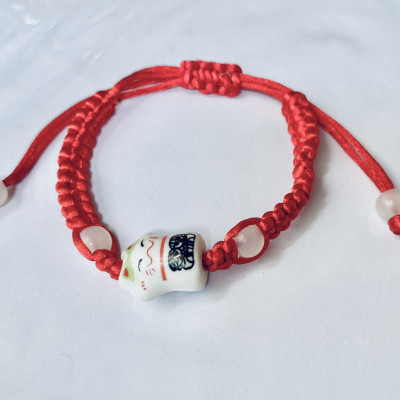 Vòng tay chỉ đỏ con mèo may mắn