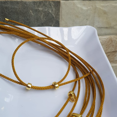 Dây thun VÀNG dẻo 2mm phối vòng tay Charm hạt đá hạt lu thống Size dây đỏ 2mm Nữ đã có hạt lu thống thì đây chính là sợi dây thun VÀNG phối với hạt lu thống đeo xinh ạ
