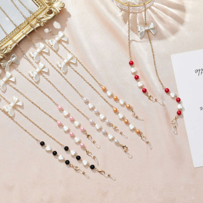 Dây kính chuỗi dây chuyền đeo gọng kiếng đeo khẩu trang mix nơ và trái tim phong cách thời trang nổi bật hot girl